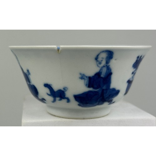 60 - A CHINESE KANGXI PERIOD BOWL DECORATED WITH FIGURES, DOGS AND FLOWERS,

8cm x 8cm x 4.2cm