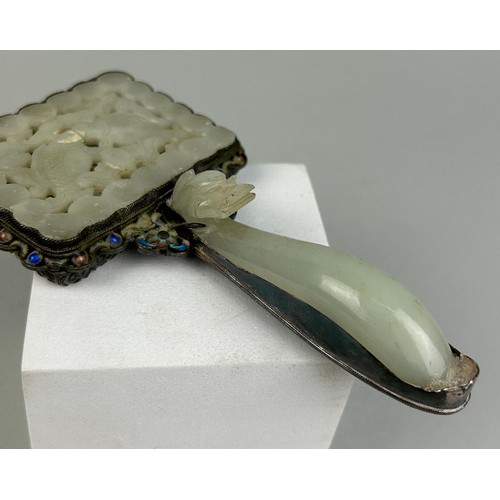 31 - AN 18TH CENTURY CHINESE 'TWIN FISH' JADE PLAQUE SET IN AN ENAMELLED SILVER MIRROR WITH JADE HANDLE W... 