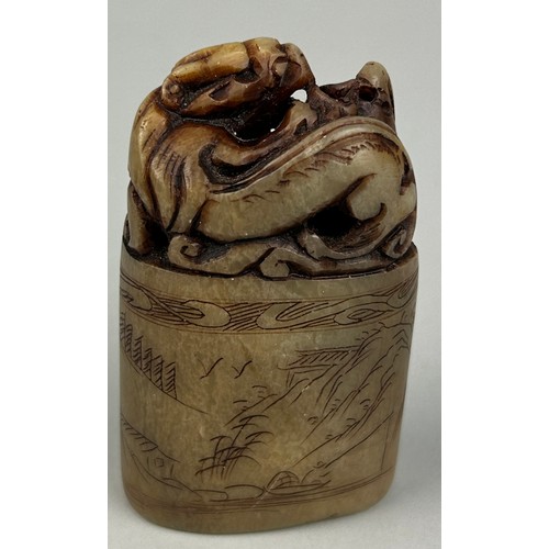 107 - A 19TH CENTURY CHINESE SOAPSTONME SEAL WITH A LION AND CALLIGRAPHY,

7.5cm x 4.5cm x 2.3cm