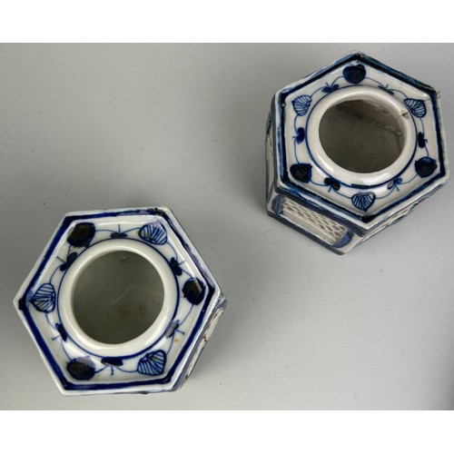 78 - A PAIR OF 20TH CENTURY BLUE AND WHITE PORCELAIN RETICULATED INCENSE BURNERS,

10cm x 5cm each. 

Som... 