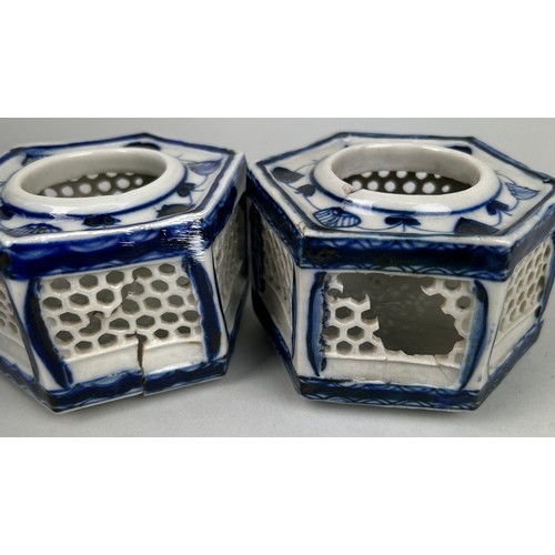 78 - A PAIR OF 20TH CENTURY BLUE AND WHITE PORCELAIN RETICULATED INCENSE BURNERS,

10cm x 5cm each. 

Som... 