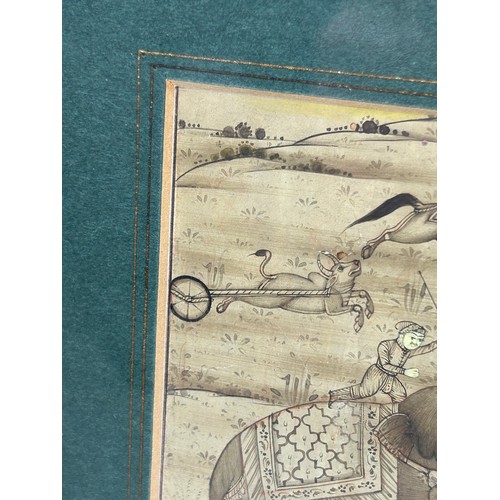 105 - A 19TH CENTURY INDIAN ALBUM PAGE DEPICTING FIGURES HUNTING RIDING HORSE BACK AND ON ELEPHANTS,

9cm ... 