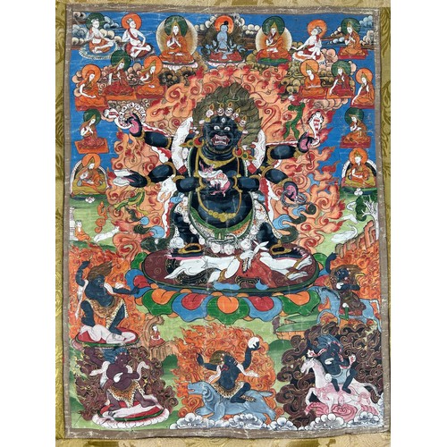 100 - A 19TH CENTURY TIBETAN PAINTED SILK SCROLL WALL HANGING, 

46cm x 34cm 

With silk border 86cm x 60c... 