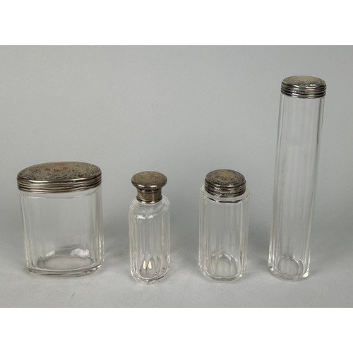 158 - FOUR GLASS BOTTLES WITH SILVER TOPS (4)