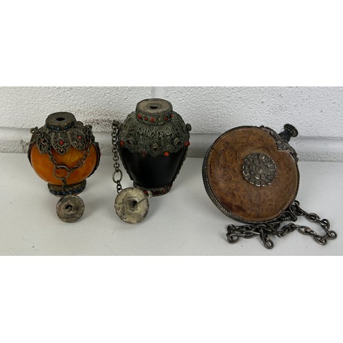 108A - A GROUP OF THREE SNUFF BOTTLES DECORATED WITH RED AND BLUE CABOCHONS (3) 

One amber coloured. All w... 