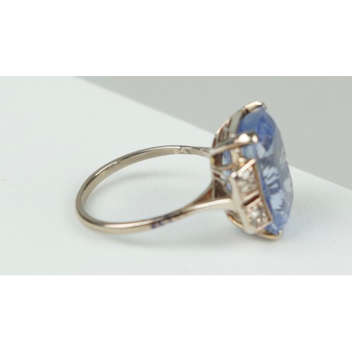 163 - A 15.76CT SAPPHIRE, DIAMOND AND 18CT WHITE GOLD RING, 

Weight 6.6gms 

With certificate from Gemmol... 