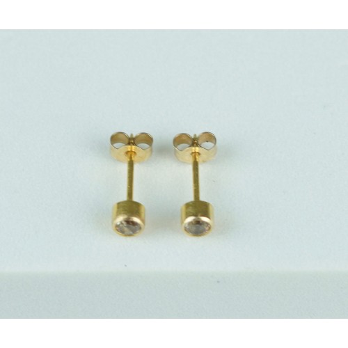 213 - A PAIR OF SMALL DIAMOND EARRINGS IN 9CT GOLD (2),

Weight: 0.45gms