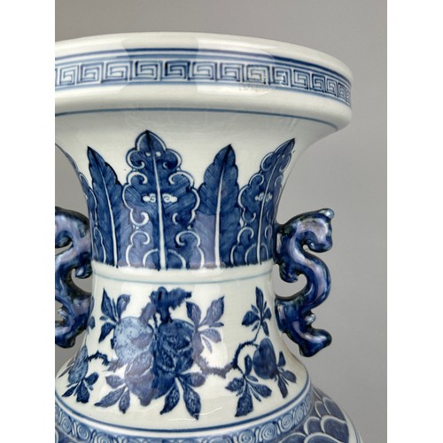 114B - A LARGE CHINESE BLUE AND WHITE VASE, 19TH CENTURY, 

62cm x 26cm