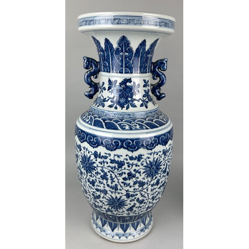 114B - A LARGE CHINESE BLUE AND WHITE VASE, 19TH CENTURY, 

62cm x 26cm