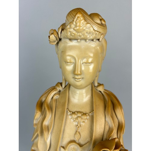 114J - A LARGE BLANC DE CHINE CHINESE FIGURE OF A GUANYIN, 

54cm H