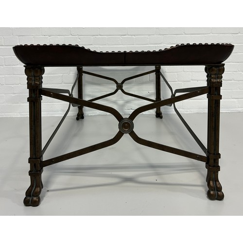 516A - MAITLAND SMITH: A REGENCY STYLE COFFEE TABLE WITH CAST METAL BASE RAISES ON FOUR COLUMN LEGS AND LIO... 