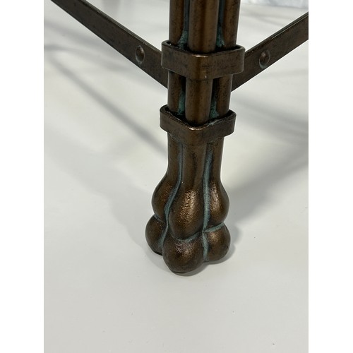 516A - MAITLAND SMITH: A REGENCY STYLE COFFEE TABLE WITH CAST METAL BASE RAISES ON FOUR COLUMN LEGS AND LIO... 