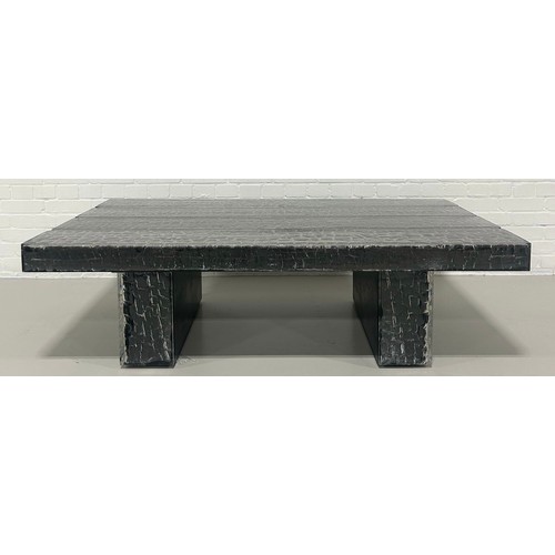 516B - TIMOTHY OULTON: A 'GLACIER' COFFEE TABLE IN SIMULATED BURNT WOOD,

Constructed from four wooden beam... 