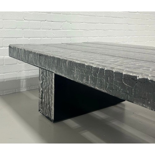 516B - TIMOTHY OULTON: A 'GLACIER' COFFEE TABLE IN SIMULATED BURNT WOOD,

Constructed from four wooden beam... 