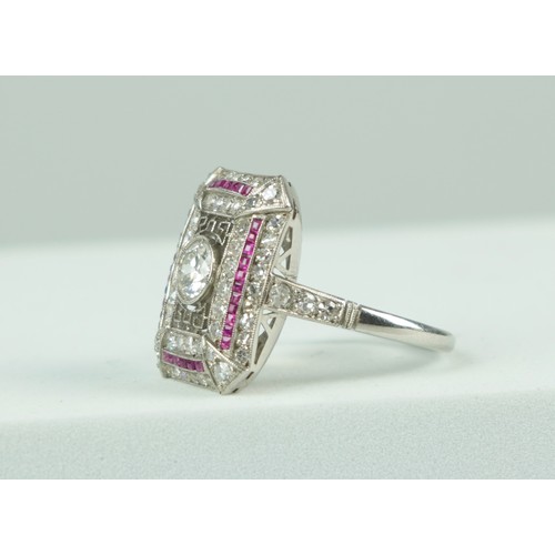 188A - A RING SET WITH CENTRAL DIAMOND SURROUNDED BY RUBIES AND DIAMONDS,

Weight 6.4gms

Marked LF possibl... 