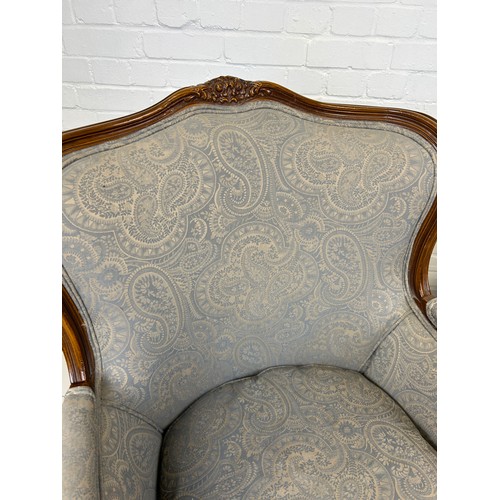 447 - A PAIR OF FRENCH WALNUT BERGERE ARMCHAIRS UPHOLSTERED IN GREY PAISLEY FABRIC, 

91cm x 74cm x 68cm e... 