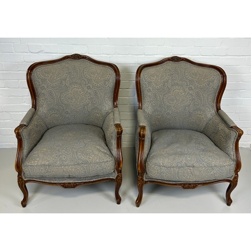 447 - A PAIR OF FRENCH WALNUT BERGERE ARMCHAIRS UPHOLSTERED IN GREY PAISLEY FABRIC, 

91cm x 74cm x 68cm e... 