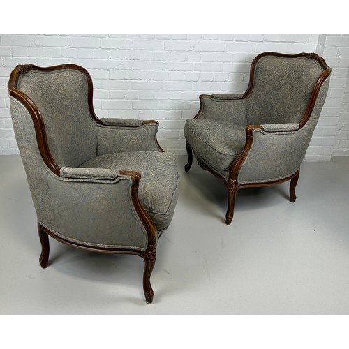 447 - A PAIR OF FRENCH WALNUT BERGERE ARMCHAIRS UPHOLSTERED IN GREY PAISLEY FABRIC, 

91cm x 74cm x 68cm e... 