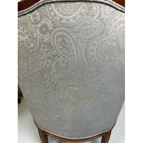 447 - A PAIR OF FRENCH WALNUT BERGERE ARMCHAIRS UPHOLSTERED IN GREY PAISLEY FABRIC, 

91cm x 74cm x 68cm e... 