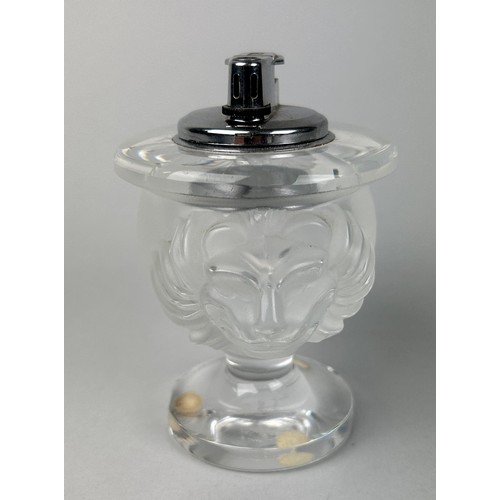 266 - A LALIQUE FROSTED GLASS TABLE LIGHTER WITH FROSTED GLASS LIONS HEADS,

Chip to one side of base.

12... 