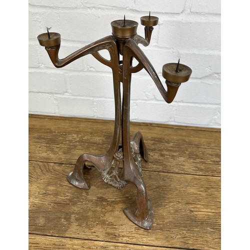 409 - AN ART NOUVEAU CANDELABRA WITH FOUR PRICKET CANDLEHOLDERS AND GREEN SHADE,