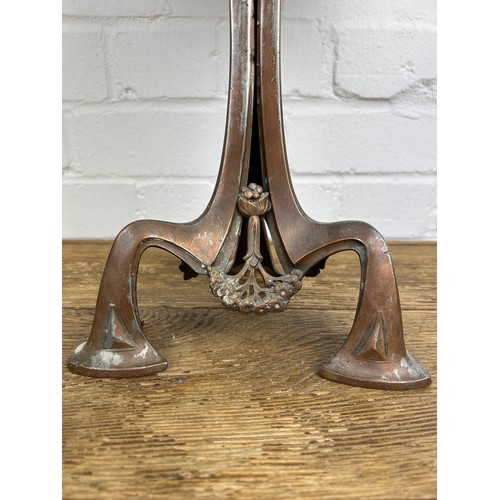 409 - AN ART NOUVEAU CANDELABRA WITH FOUR PRICKET CANDLEHOLDERS AND GREEN SHADE,