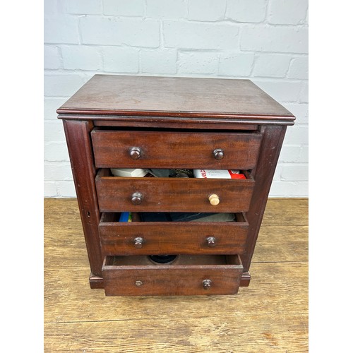 410 - A 19TH CENTURY MAHOGANY MINIATURE WELLINGTON CABINET OR COLLECTORS CABINET WITH FOUR DRAWERS