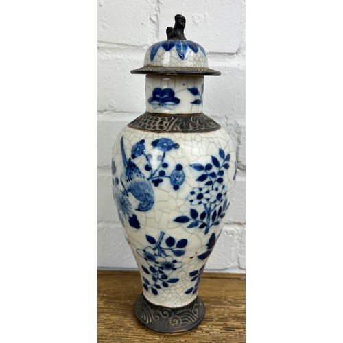 157 - A CHINESE BLUE AND WHITE CRACKLE GLAZED VASE AND COVER,

33cm H