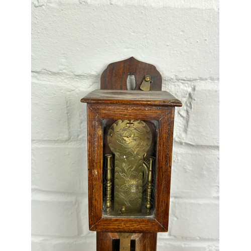 406 - A 19TH CENTURY BAROMETER WITH WOODEN CASE,