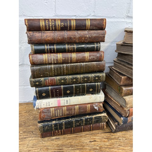 596 - A COLLECTION OF DECORATIVE LEATHER BINDINGS (QTY)