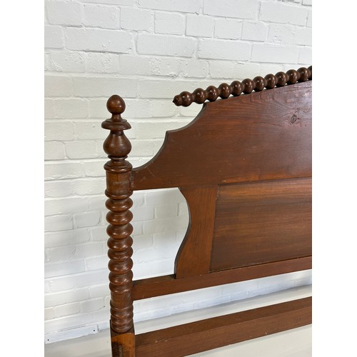 452 - A LARGE 19TH CENTURY MAHOGANY TURNED BED,

204cm x 144cm x 129cm (headboard height).