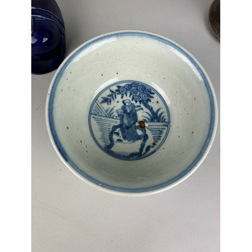 168 - CHINESE CERAMICS: A BLUE AND WHITE BOWL, SEATED FIGURE OF A BUDDHA, BLUE AND WHITE VASE AND COVER (3... 