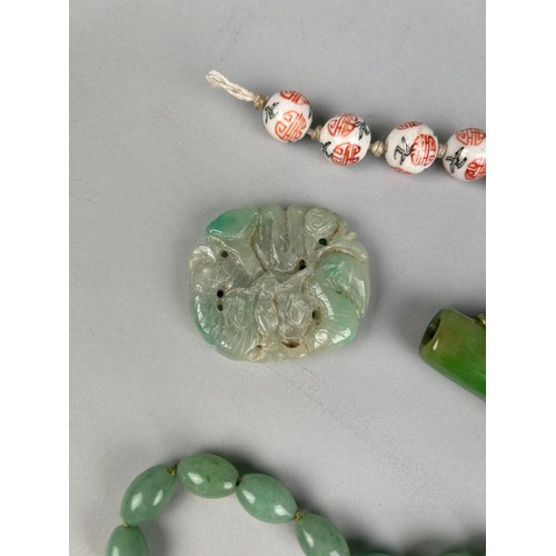 196 - A COLLECTION OF CHINESE JADES AND BEADS (4)