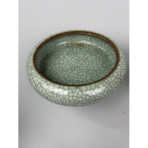 185 - A CHINESE CRACKLE GLAZED BOWL ALONG WITH ANOTHER ARCHAIC STYLE AND TWO TEXTILES (4) 

Crackle glazed... 