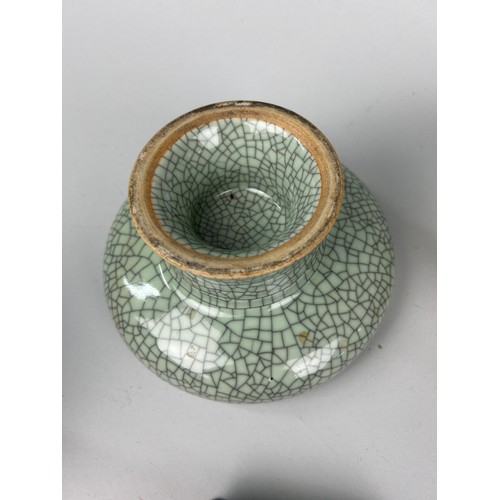 185 - A CHINESE CRACKLE GLAZED BOWL ALONG WITH ANOTHER ARCHAIC STYLE AND TWO TEXTILES (4) 

Crackle glazed... 