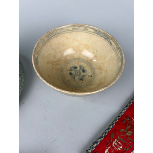 185 - A CHINESE CRACKLE GLAZED BOWL ALONG WITH ANOTHER ARCHAIC STYLE AND TWO TEXTILES (4) 

Crackle glazed... 