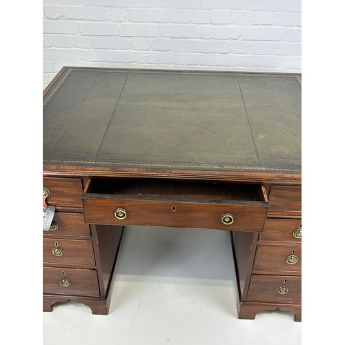 440 - AN EARLY 19TH CENTRAL PARTNERS DESK, 

Two pedestals, each with ten drawers with brass handles. Gree... 