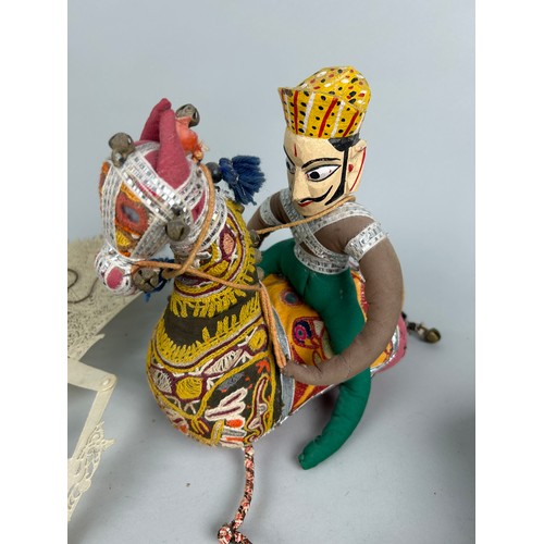 227 - TWO SOUTHEAST ASIAN PUPPETS ALONG WITH AN INDIAN RIDER ON HORSEBACK, 

Largest: 53cm x 23cm