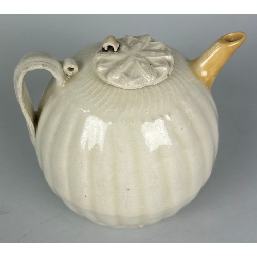 183 - A CHINESE QINGBAI EWER OF MELON SHAPE, SONG TO YUAN DYNASTY, 

Restored spout. 

9.5cm x 9.5cm