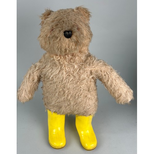 594 - A VINTAGE BEAR POSSIBLY GERMAN IN YELLOW BOOTS

45cm x 42cm