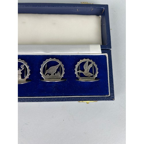 302 - A SET OF SIX SILVER PLACE CARD HOLDERS BY J.A. CAMPBELL (6) IN ORIGINAL CASE
 
Weight: 78gms