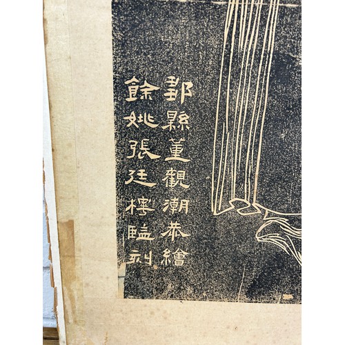 142 - A LARGE CHINESE PRINT DEPICTING A FIGURE WITH CALLIGRAPHY, 

112cm x 42cm 

The sheet laid on cardbo... 