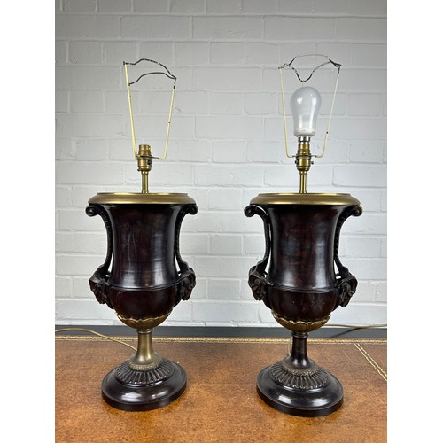 432 - A PAIR OF BRONZE CLASSICAL URN TABLE LAMPS. WITH RAMS HEAD HANDLES (2),

54cm x 23cm