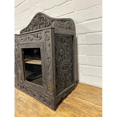 418 - A CHARLES II DESIGN CARVED OAK CABINET, 

One glass missing, some damage

71cm x 44cm x 24cm