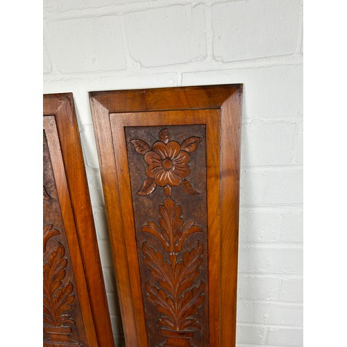 550 - A PAIR OF DECORATIVE WOODEN PANELS WITH CARVED URNS AND FLOWERS (2), 

67cm x 22cm