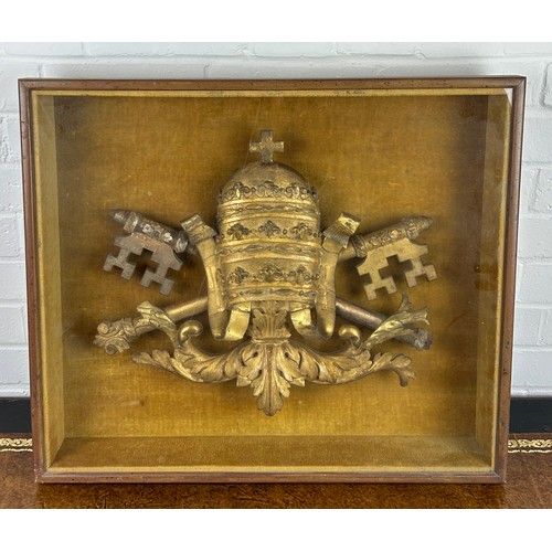 252 - A GILTWOOD PAPAL FRAGMENT: KEYS OF HEAVEN, 

Possibly Italian.

Mounted in a glazed wooden case with... 