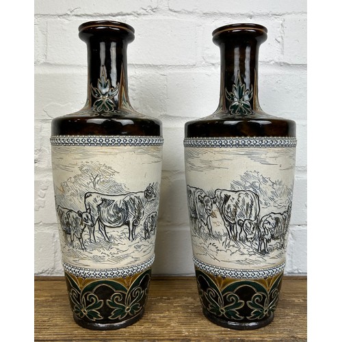 277 - A PAIR OF VASES BY HANNAH BARLOW FOR DOULTON LAMBETH DEPICTING COWS AND SHEEP (2)

32cm H each.