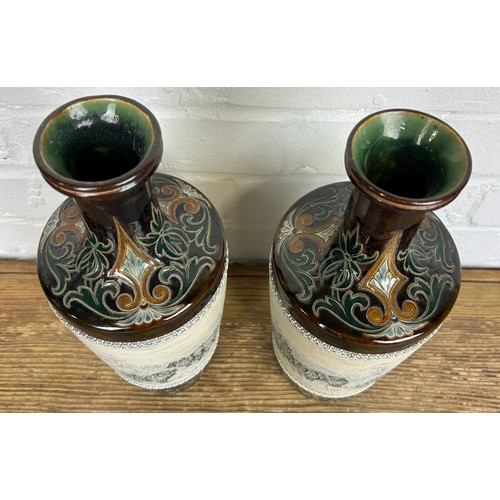 277 - A PAIR OF VASES BY HANNAH BARLOW FOR DOULTON LAMBETH DEPICTING COWS AND SHEEP (2)

32cm H each.