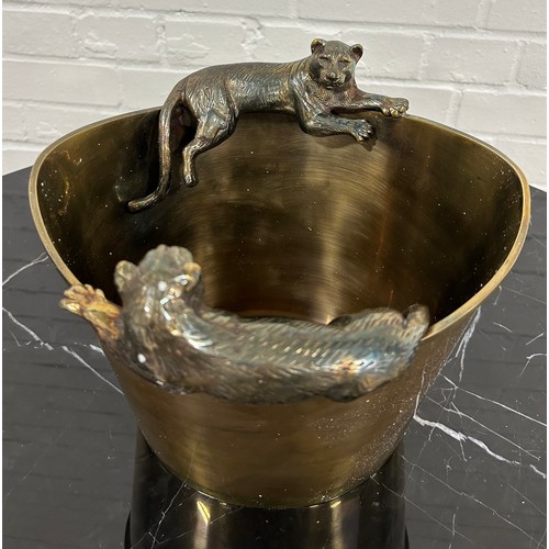 565 - EICHOLTZ: A BRASS CHAMPAGNE COOLER WITH LION HANDLES,