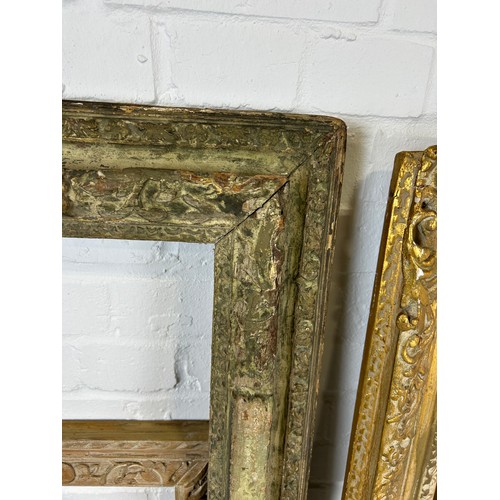 121A - A COLLECTION OF ANTIQUE PICTURE FRAMES, 

To include a large giltwood example. 

Largest frame: 120c... 